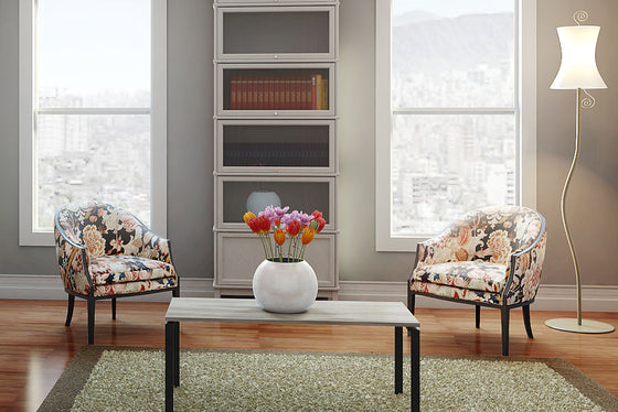 A stack of Barrister Bookcase shelf sections in white tidy books, paper and miscellany. 