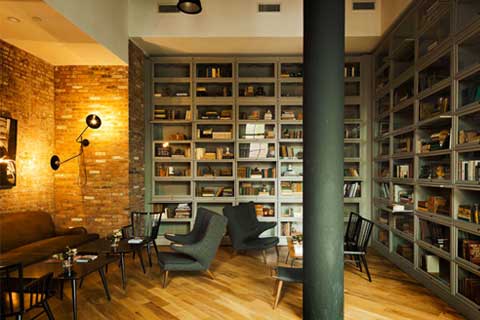 Hale Barrister Bookcases in light green finish at Wythe Hotel